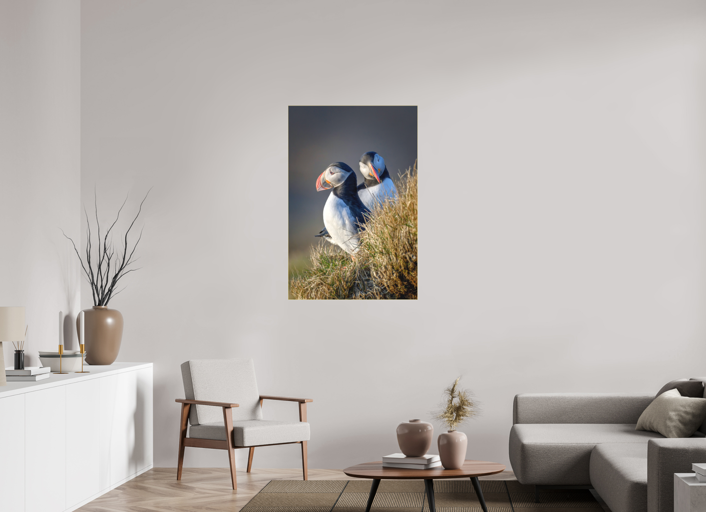 Atlantic Puffin 30×45″ gallery-quality color acrylic print by Richard H Knight, displayed in a modern living room with white credenza, modern chair, coffee table on a rug and cloth sofa
