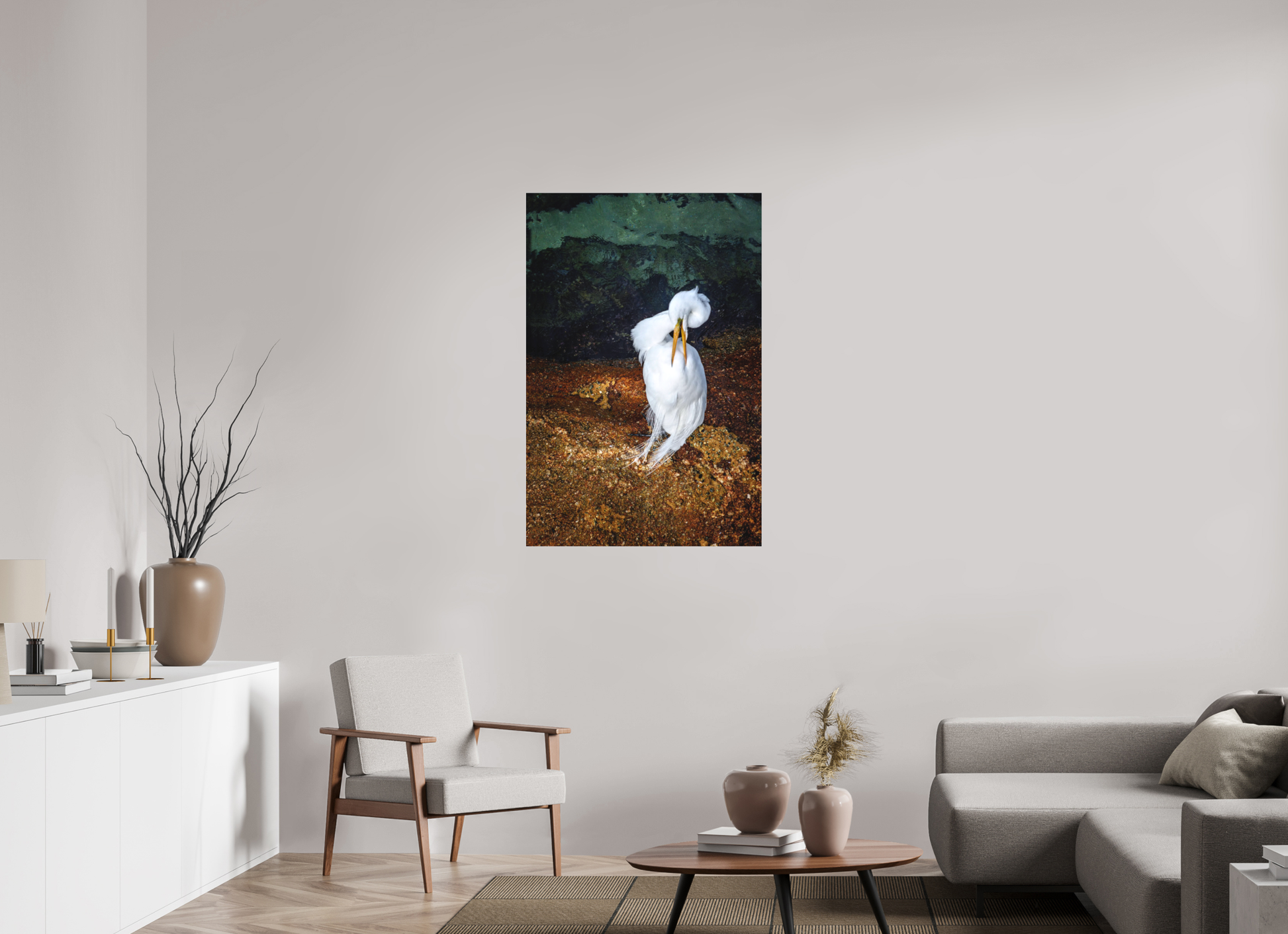 Framed great egret photography print, 30x45 inches, acrylic finish, displayed in a modern living room with credenza, chair, rug, coffee table and sofa