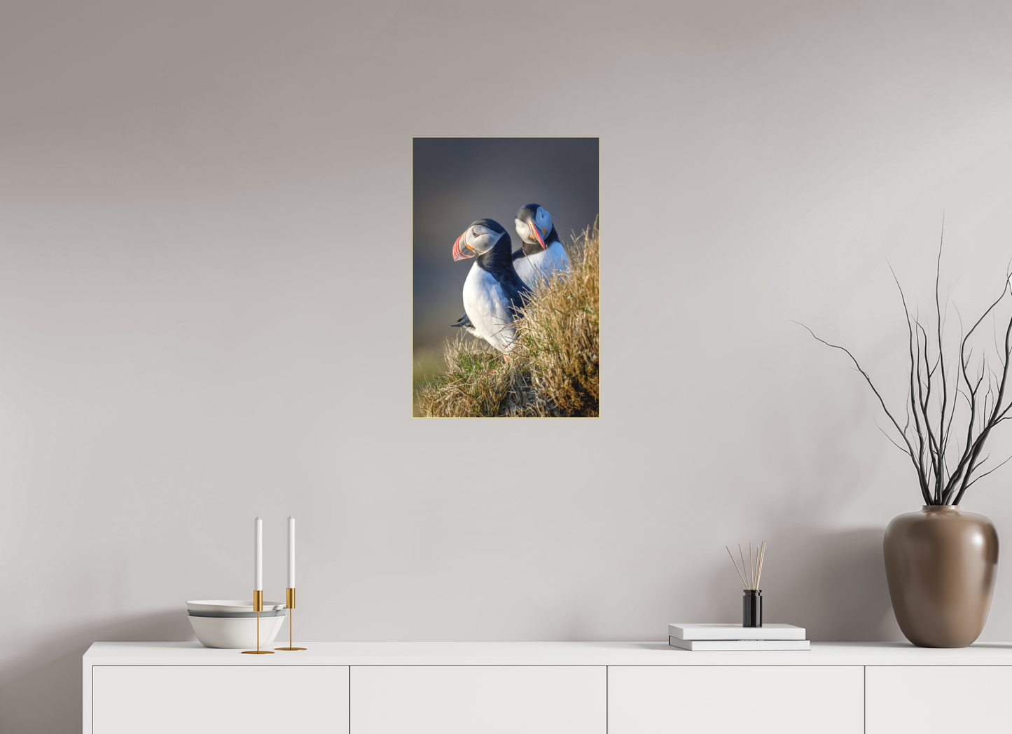 Atlantic Puffin 16×24″ gallery-quality color acrylic print by Richard H Knight, displayed above a white credenza with decorative items