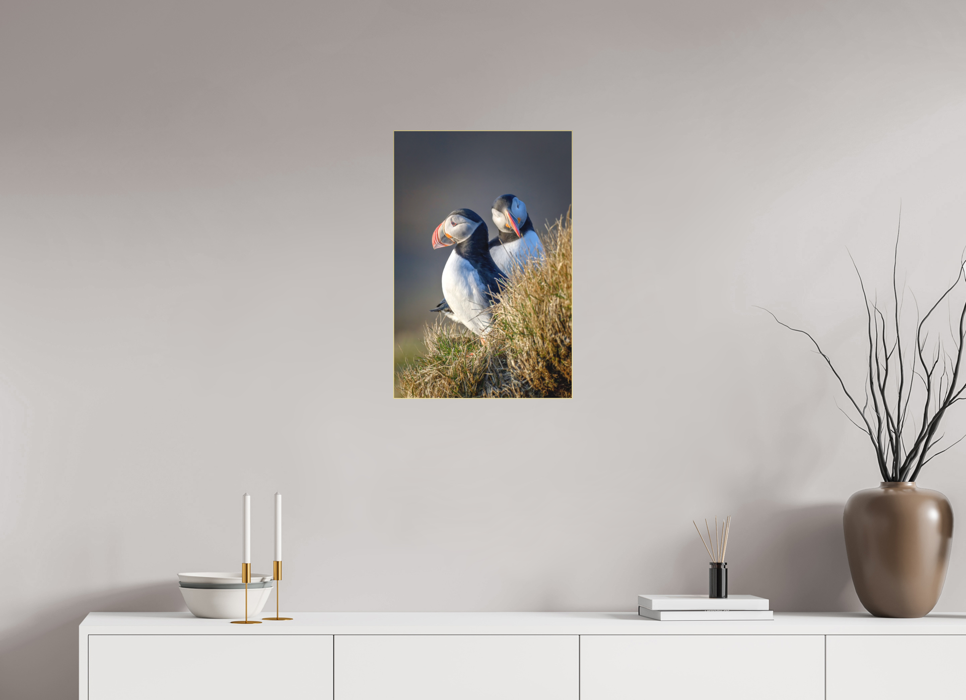 Atlantic Puffin 16×24″ gallery-quality color acrylic print by Richard H Knight, displayed above a white credenza with decorative items